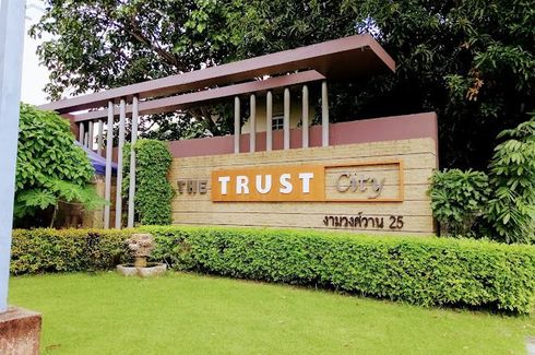 THE TRUST CITY